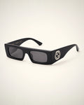 Gucci Rectangular GG Black Sunglasses, gafas de sol de lujo con perfil distintivo.