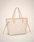 Louis Vuitton Neverfull MM Monogram, bolso de lujo de silueta reconocible.
