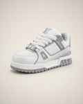 Trainer Maxi blanco y gris con cordones sobredimensionados y suela chunky de bloques.