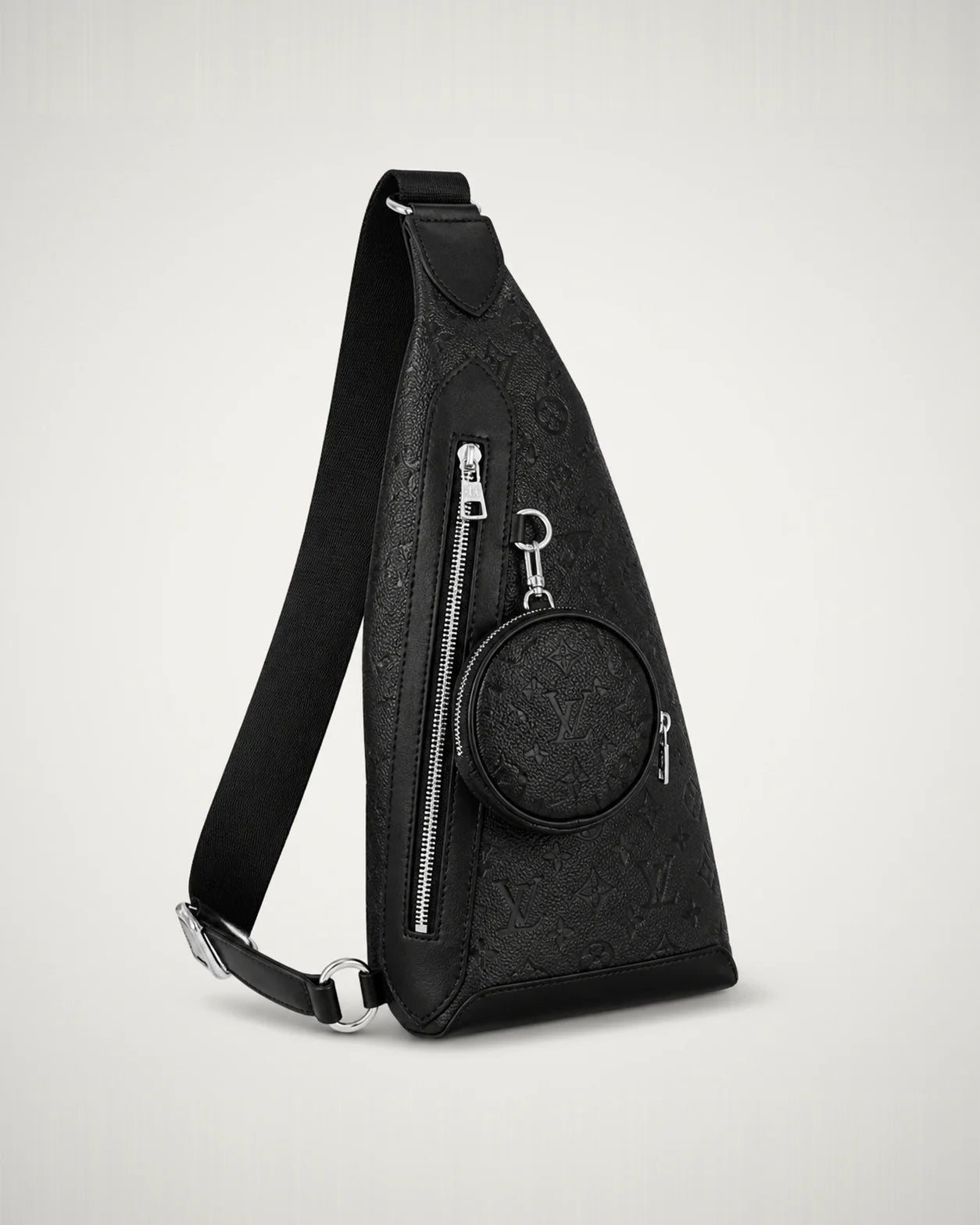 Bolso cruzado negro tonal con monedero circular.